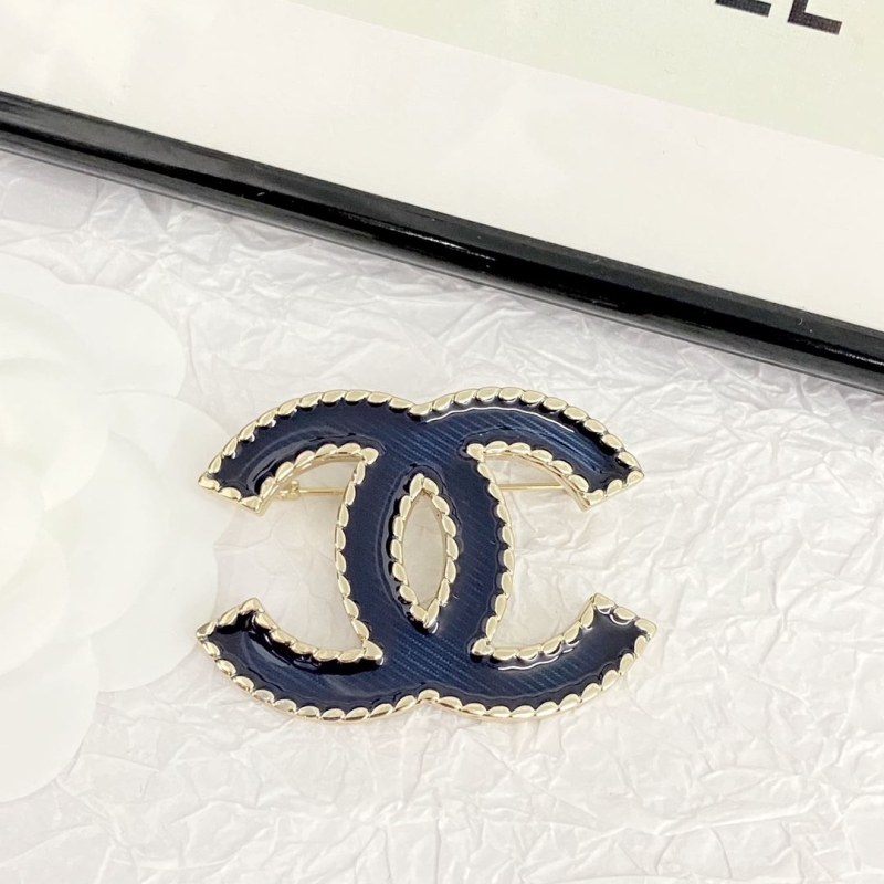 Ch*el brooches